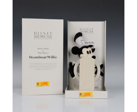 This Steiff version of Mickey Mouse, inspired by Walt Disney's classic short film Steamboat Willie, comes with a steering whe