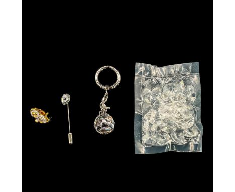 Bag of clear faceted heart shaped crystal, two sizes, unopened. Gold lion lapel pin with clear crystals, 0.75"L. SCS black sw