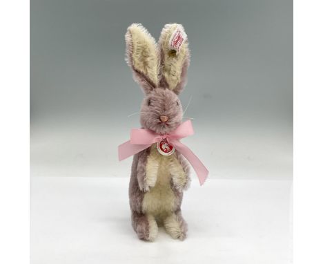 Light purple and white standing rabbit with a pink bow around the neck. Steiff tag attached. American Heritage series. Includ