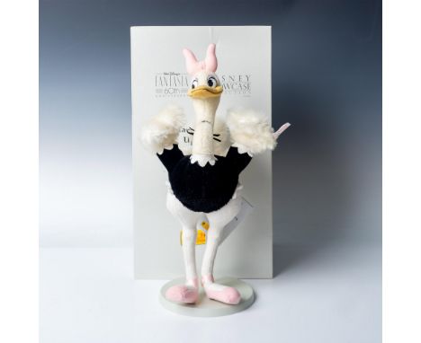 The black and off-white ostrich Madame Upanova standing with a pink bow on her head. Celebrating the 60th Anniversary of the 