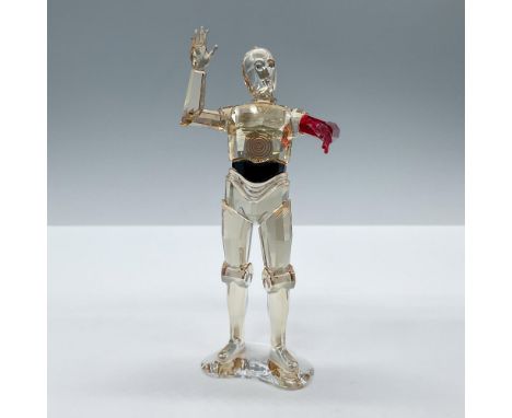 Beautifully crafted in golden and red crystal with black detailing and a white crystal base, this ever-helpful droid from Sta