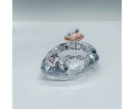 Clear crystal candle holder. Fully faceted asymmetrical tealight in clear crystal with a heart in the colors bright and Light