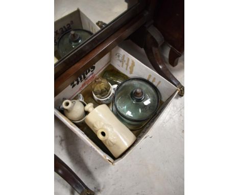 A selection of vintage glass and earthenware bottles and jars