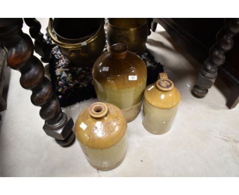 Three vintage stoneware flagons including Penrith and Hawes interest.
&nbsp;
Condition report: The large stone ware flagon ha