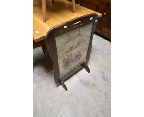 A traditional embroidered firescreen