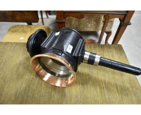 A vintage carriage lamp