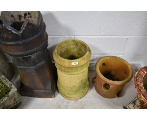 Two traditional chimney pots and a strawberry planter
