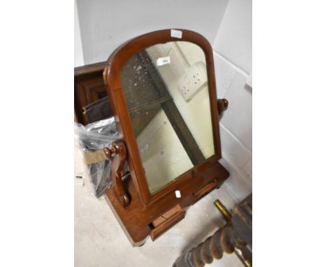 A Victorian mahogany toilet mirror and a later vintage wall mirror