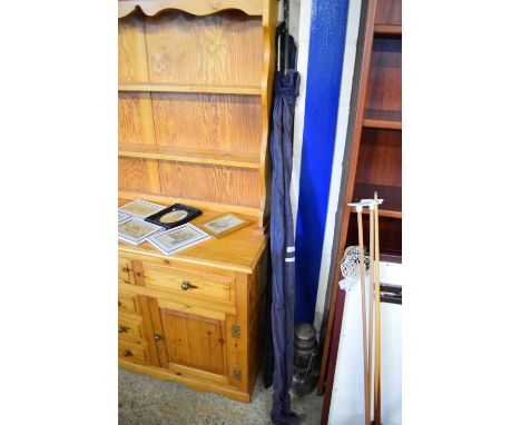 TWO FISHING RODS AND A PARAFFIN LAMP