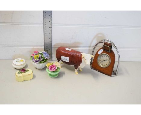 BESWICK MODEL OF A HEREFORD COW TOGETHER WITH FLORAL ENCRUSTED TRINKET BOXES, MODEL FLOWERS AND A MANTEL CLOCK IN STIRRUP MOU