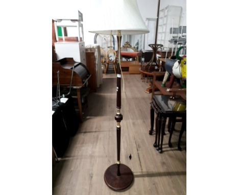 A MAHOGANY STANDARD LAMP