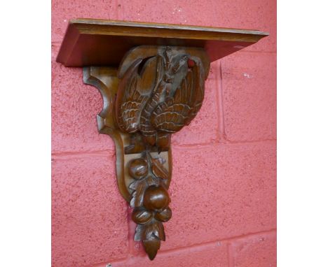 Black Forest style carved shelf depicting birds and fruit - Approx H: 42cm