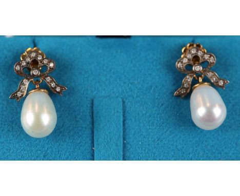 Pair of pearl &amp; diamond bow shaped earrings