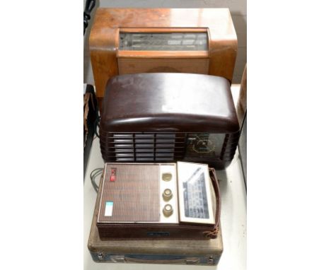 A DRAB BAKELITE MAINS RADIO BY R M ELECTRIC LTD GATESHEAD, A BUSH WALNUT MAINS RADIO AND TWO OTHER ITEMS 