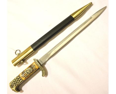 German Third Reich NSKK reenactment ceremonial dagger with faux antler grip and housed in a metal mounted leather scabbard. P