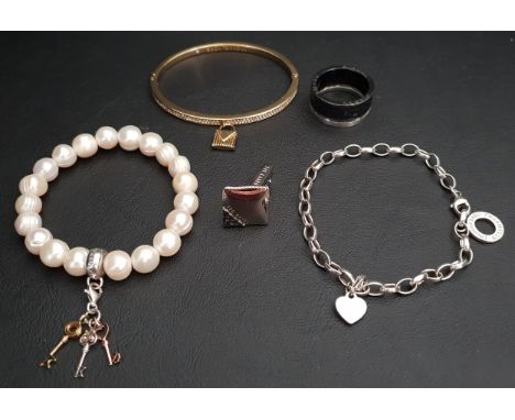 SELECTION OF FASHION JEWELLERY consisting of a Michael Kors crystal padlock bracelet, a Thomas Sabo pearl charm bracelet with