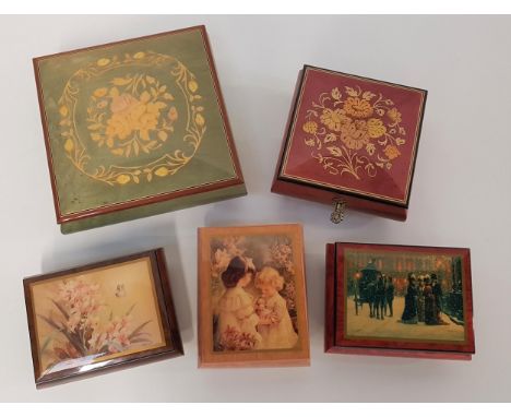 FIVE ITALIAN LACQUERED MUSICAL JEWELLERY BOXEScomprising one with inlaid flowers on a green ground playing Swan Lake, 20cm wi