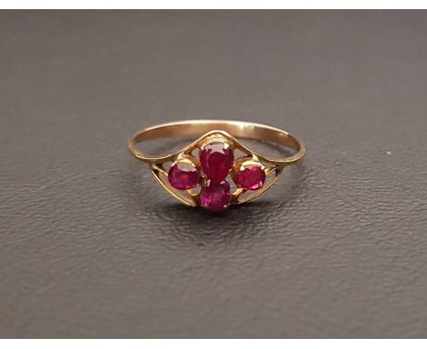 RUBY CLUSTER RINGthe four rubies in pierced setting, on unmarked gold shank, ring size O-P 