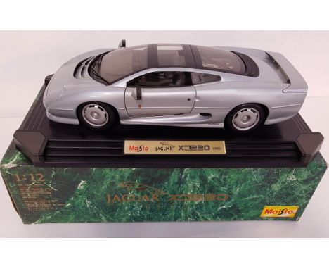 MAISTO DIECAST JAGUAR XJ220 (1992)scale 1:12, with stand and box 