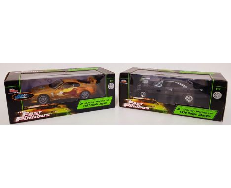 TWO ERTL DIE CAST 'THE FAST AND THE FURIOUS' VEHICLEScomprising the 1970 Dodge Charger and the 1993 Toyota Supra, both scale 