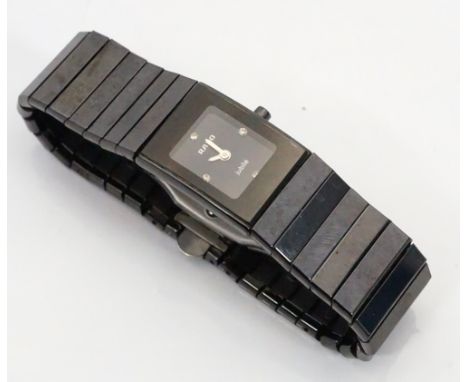 LADIES RADO JUBILÉ DIASTAR BLACK CERAMIC WRISTWATCHthe black dial with diamonds at 3, 6, 9 and 12; the backplate numbered 152