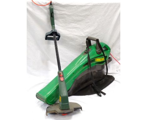 ELECTRIC COMBINATION GARDEN VAC/LEAF BLOWERwith built in leaf shredder and removable hopper, together with a Black & Decker e