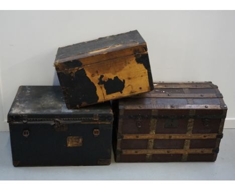 TWO VINTAGE METAL BOUND TRAVEL TRUNKSone labelled to the interior 'J.Milford, 7 Union Passage, Bath', both with metal carryin