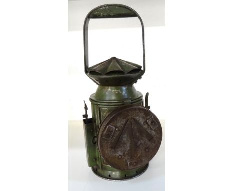 WWII WAR DEPARTMENT 'C.EASTGATE & SON' TRI-COLOUR RAILWAY LAMPwith a fixed carry handle above a rotating blue, red and clear 