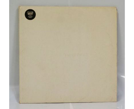 THE BEATLES / THE WHITE ALBUMdouble album in white vinyl (German), with poster and four portrait cards of the band one being 