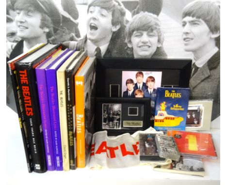 'THE BEATLES' INTERESTa small collection of items including framed and other film cells ('A Hard Day's Night' noted), framed 