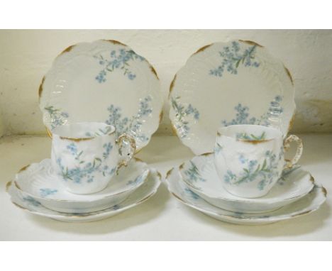 LIMOGES PORCELAIN TEA SERVICEwith floral and gilt decoration, comprising five cups, six saucers, and six side plates (17), th