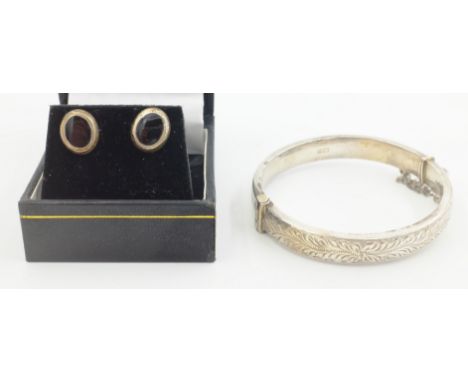 Silver bangle by Smith & Pepper Ltd Birmingham 1967 and a pair of silver jet stud ear-rings stamped 925   Condition Report   