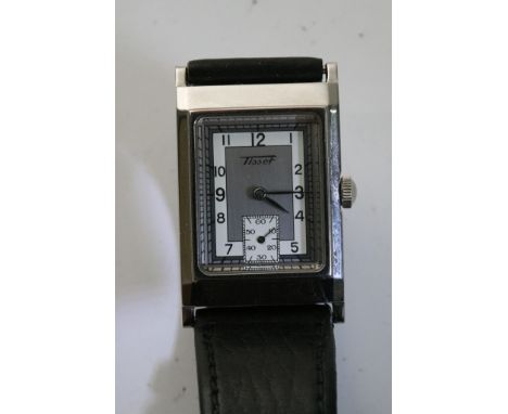 An Art Deco design medium Tissot watch the rectangular dial with second subsidiary dial and leather strap.