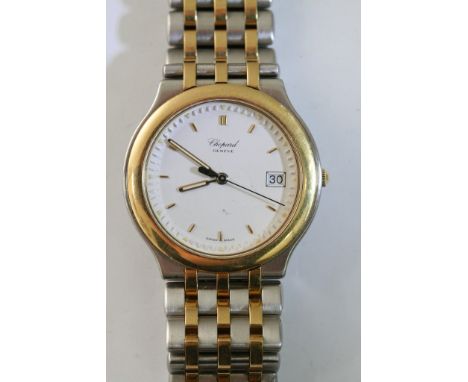 A gents Chopard 18ct gold and stainless steel wrist watch with baton numerals, set in a two tone strap