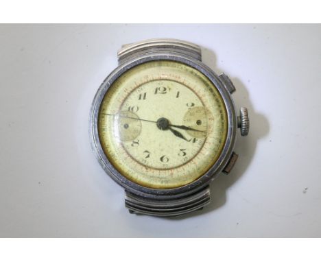 A rare 1930s chrome cased chronograph watch, double button, outer mileage dial, two subsidiary dials (two hands missing)