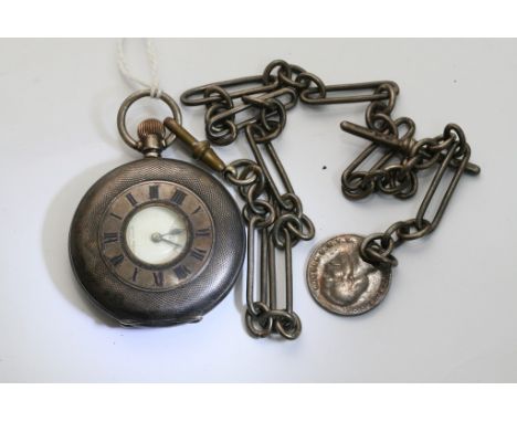 A Silver case half Hunter button wind pocket watch with attached chain 