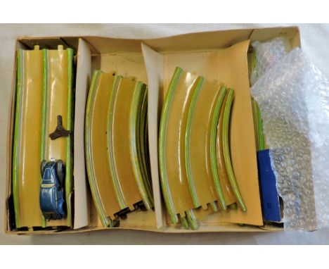 A vintage 'Stream' Speedway set, original box, tin plate with track and two wind-up cars by Louis. Marx & Co Ltd, quite scarc