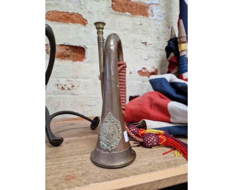 A Scottish Argyll and Sutherland Highlanders brass and copper bugle with regimental badge. 