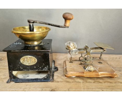 A set of postal scales with weights together with a coffee mill by A.Kenrick &amp; Sons. 