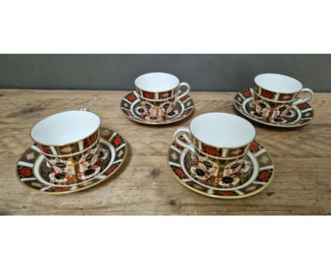 A set of four Royal Crown Derby 1128 Imari teacups and saucers. 