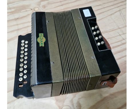 A Czechoslovakian Invicta accordion 