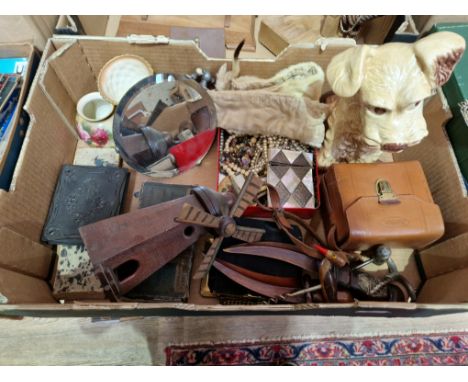 A box of miscellaneous collectable items including a Sylvac dog ornament, wooden souvenir knives, corkscrews, Royal Worcester