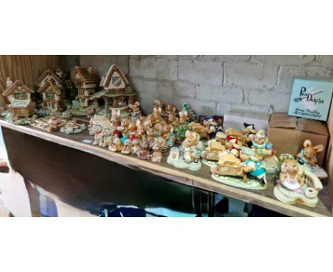 A collection of assorted PenDelfin figures &amp; houses to include various event pieces, Wooden Hut, Curiosity Shop, Cobbled 