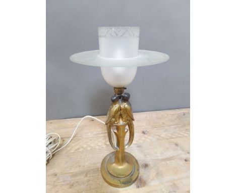 An Art Deco bronzed spelter table lamp modelled as a pair of birds below a two part etched shade, height 47cm. 