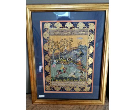 An Indo-Persian illuminated manuscript leaf, in glazed frame, total size 32cm x 41cm. 