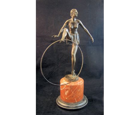 After ALONZO; an Art Deco style bronzed Figure of a Dancer on a marble plinth, 18 1/2" (47cms) high.