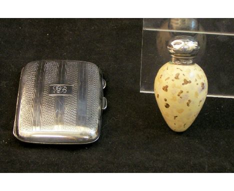 A ceramic egg shape Scent Flask with silver cover by Cornelius Desormeaux Saunders and James Francis Hollings-Shepherd (marks