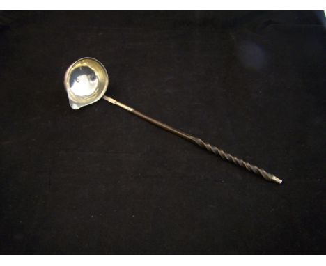 A 19th century Punch Ladle with twisted whalebone handle (unmarked).