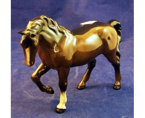 A Beswick Model of a stocky jogging Mare no. 855 third version in brown gloss (tiny ear chip).