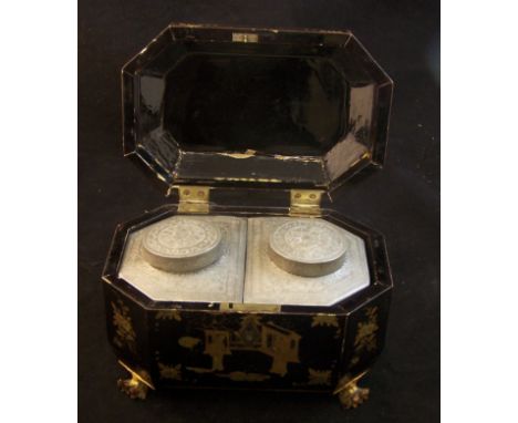 A black lacquer Tea Caddy, decorated in gilt with oriental figures and flowers, the interior fitted with two pewter container
